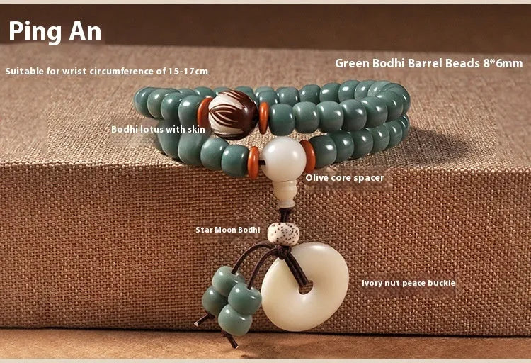 White jade bodhi and green sandalwood bracelet with a double ring safety buckle clasp.