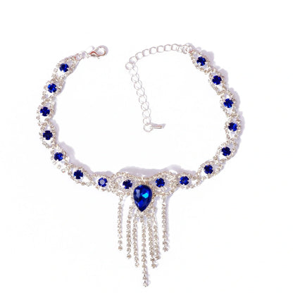 Blue rhinestone tassel anklet with gold-plated accents, perfect for women's fashion accessories.