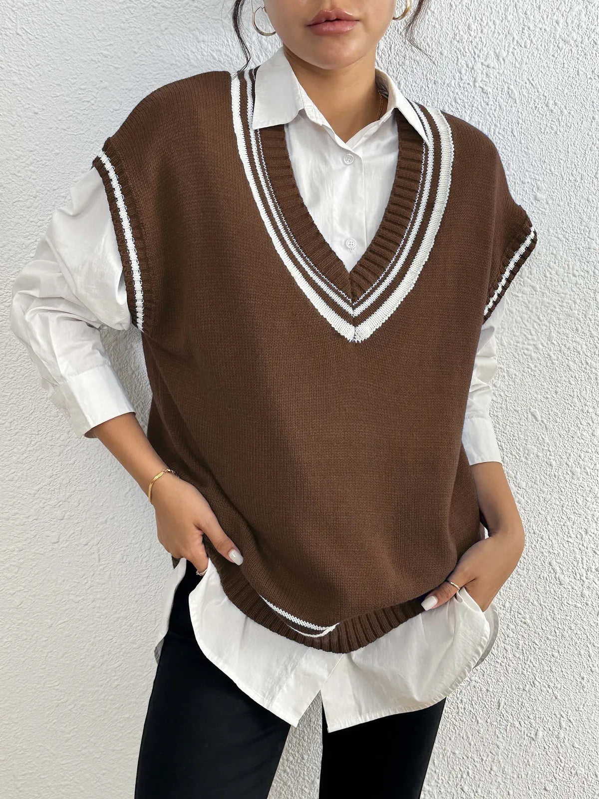 Women's college style acrylic pullover vest sweater in black, blue, and coffee colours with loose free size fit