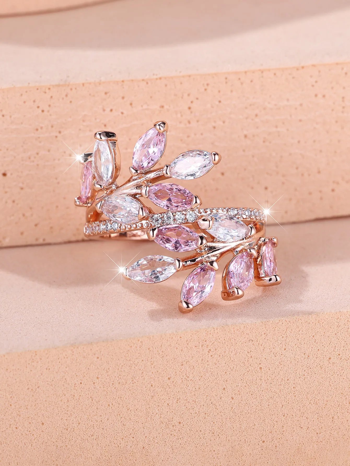 Horse Eye Zircon Leaf Ring with adjustable opening in rose gold purple white diamond colour on a hand