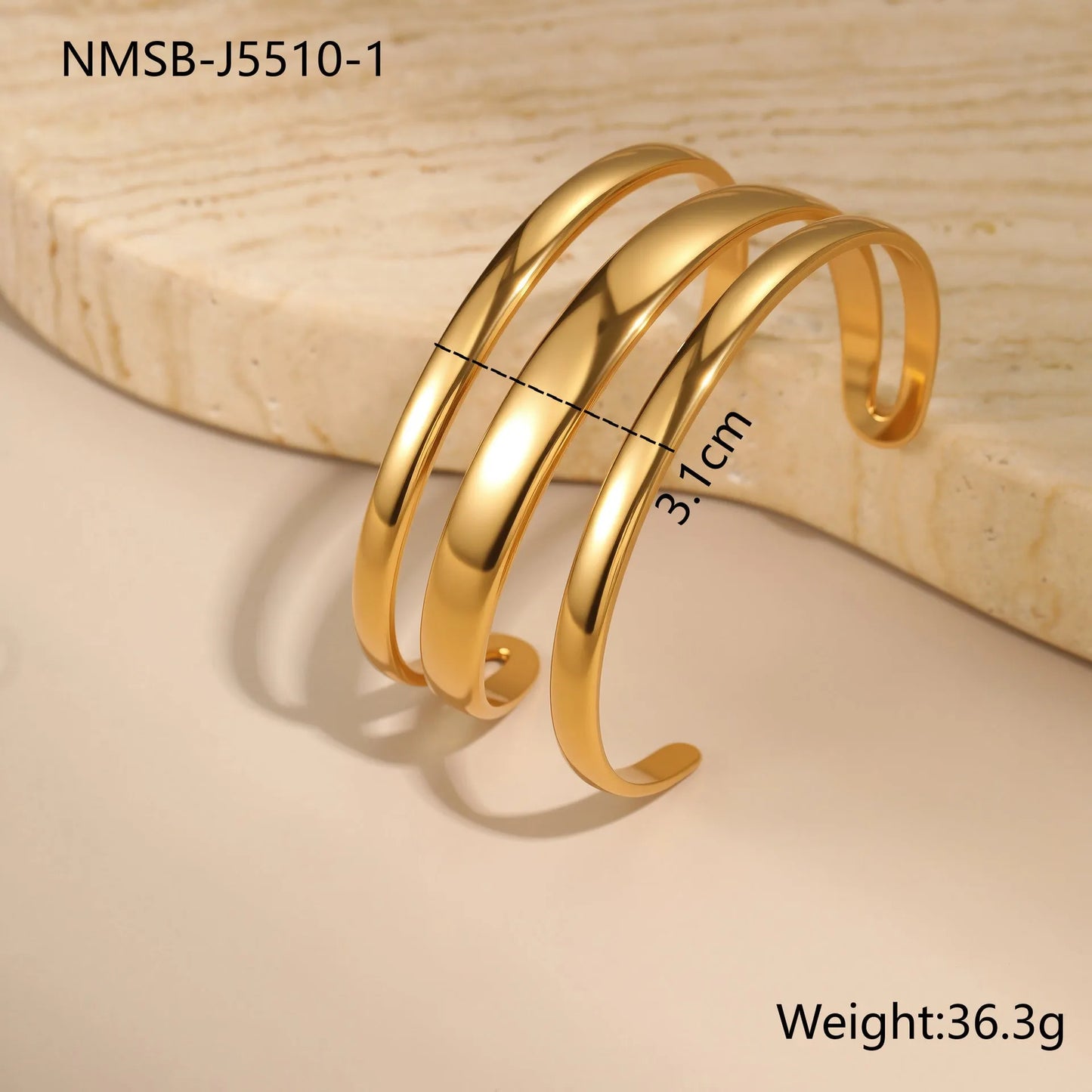 Women's stainless steel bracelet with geometric line design and simple opening clasp in gold electroplated finish