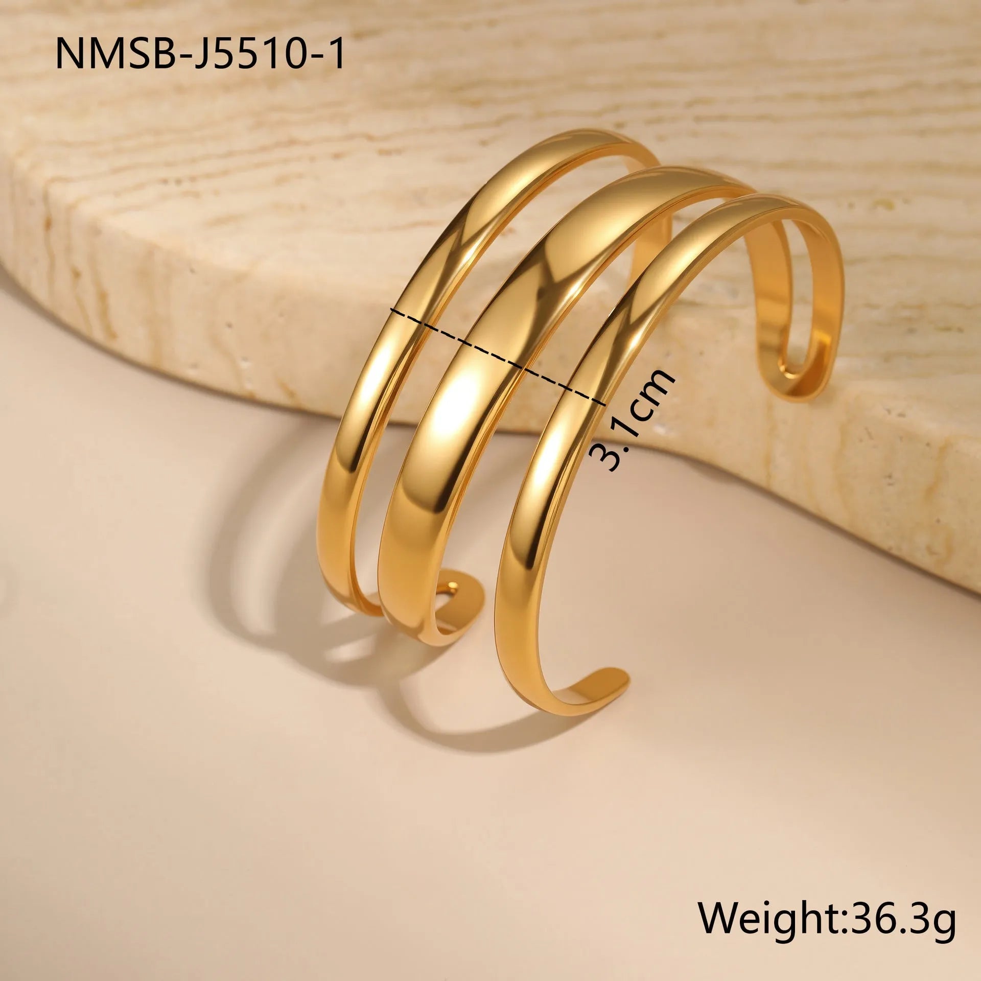 Women's stainless steel bracelet with geometric line design and simple opening clasp in gold electroplated finish
