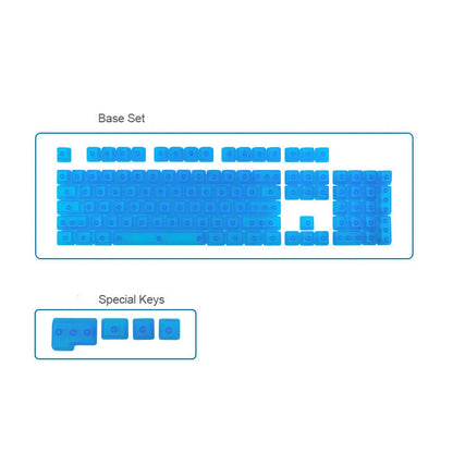 Set of 104 transparent blank PBT keycaps for mechanical keyboards in orange, white, blue, and black colours.