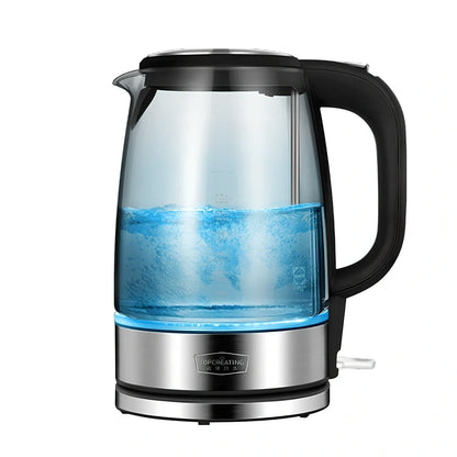 Transparent glass electric kettle showing water level scale and ergonomic handle