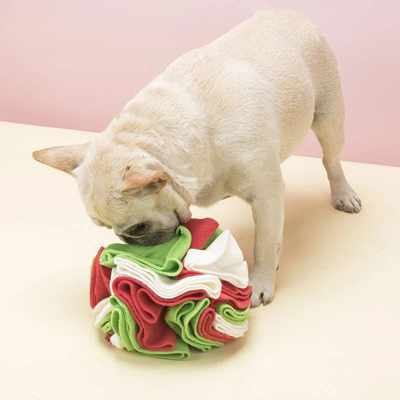 Soft and interactive puzzle ball toy made of polar fleece for dogs and cats to sniff and forage for hidden treats