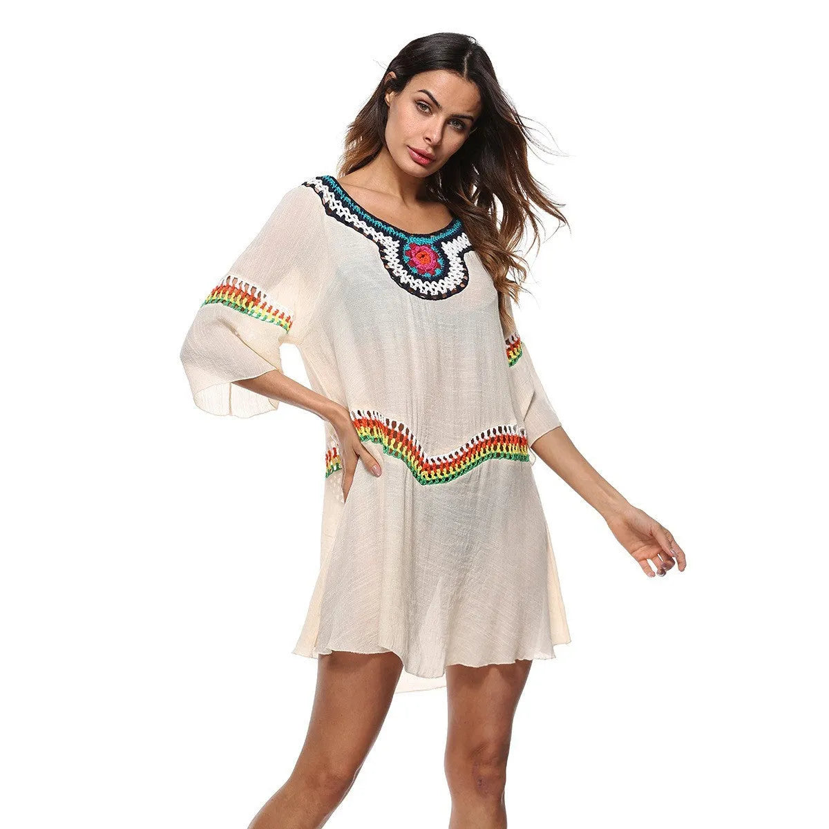 Women's crocheted ethnic style beach cover-up top in apricot colour, for sun protection.