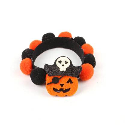 Halloween fur ball pet collar with pumpkin, pirate, witch and skull designs in six colour options