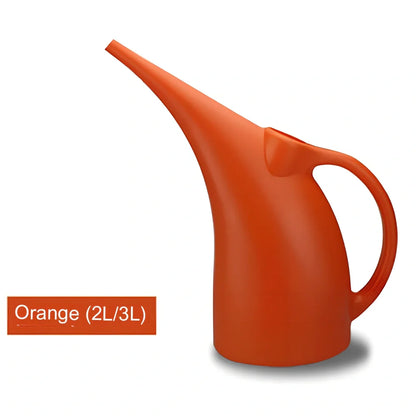 Green watering can with long spout showing measurements and shower head attachment for garden plants