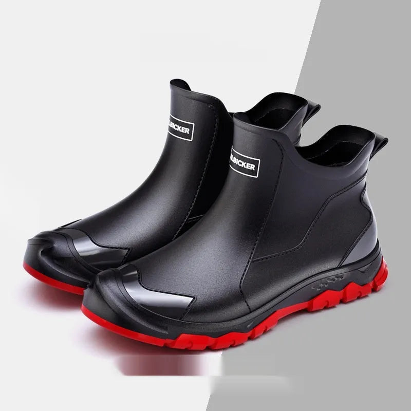 Low-cut solid colour PVC rain boot with round toe and plastic sole.