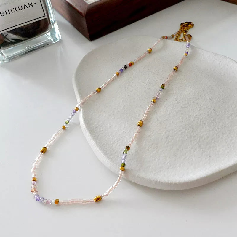 Natural stone pearl necklace with brass gold-plated chain, retro style