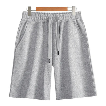 Men's straight-leg cotton casual shorts in light grey on a plain background.