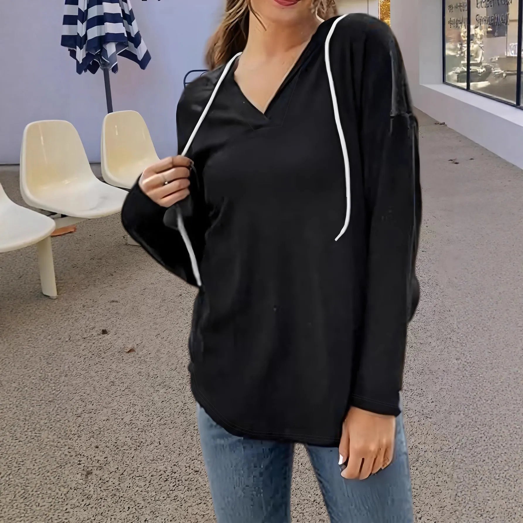 Women's red V-neck hooded sweatshirt with long sleeves and loose fit
