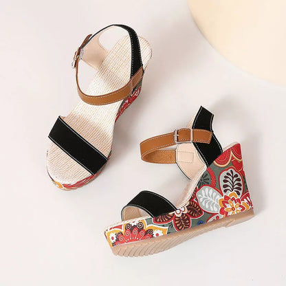 Women's floral embroidered high wedge sandals with buckle strap in black, green, and orange