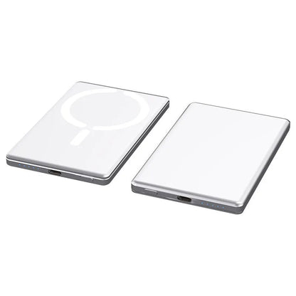 Slim dark grey magnetic power bank attached to the back of an iPhone, showing its thin 9mm profile.