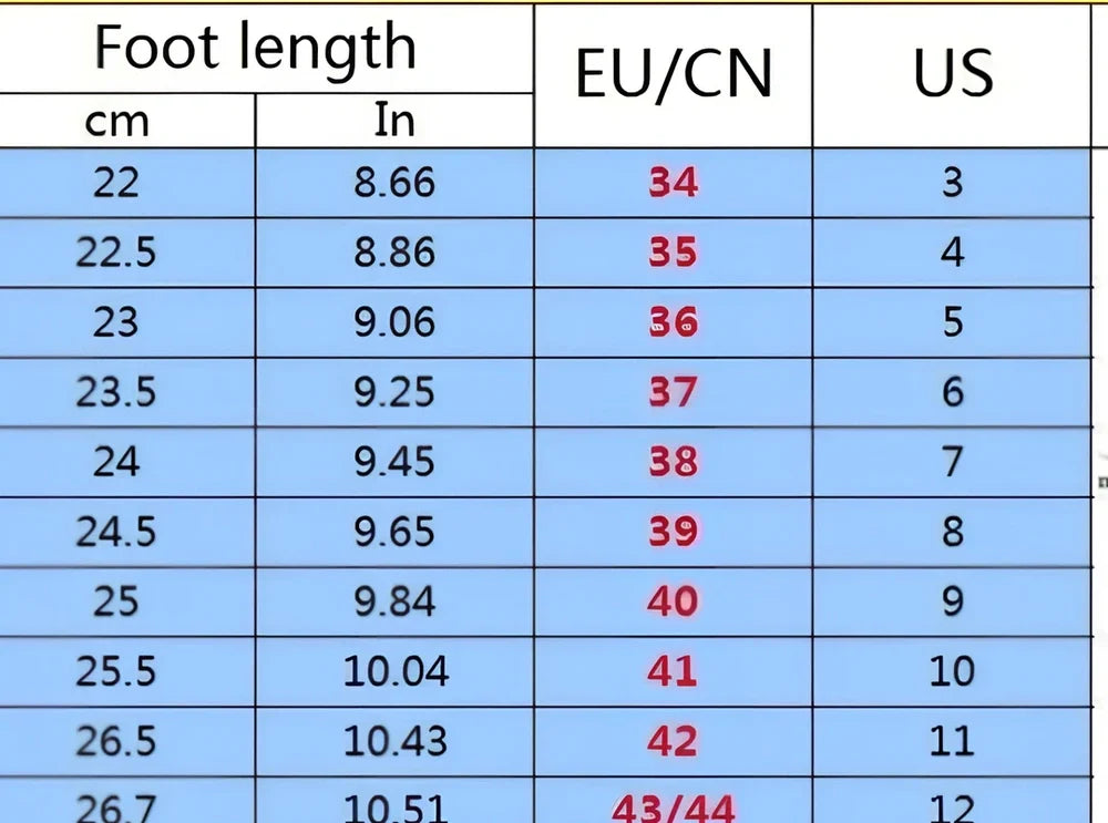 Women's black running sneakers with MD soles and cross strap detailing for jogging