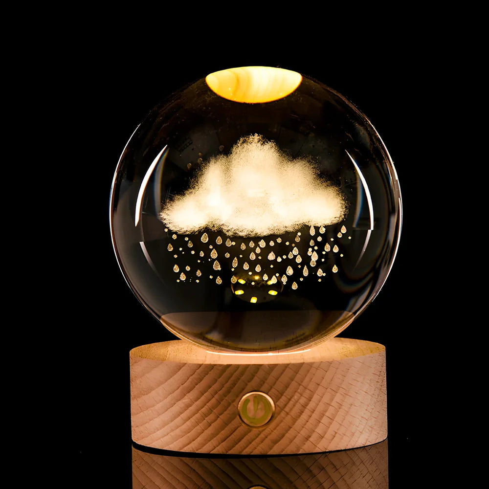 Transparent crystal ball with 3D laser inner carving of galaxy patterns on charging base