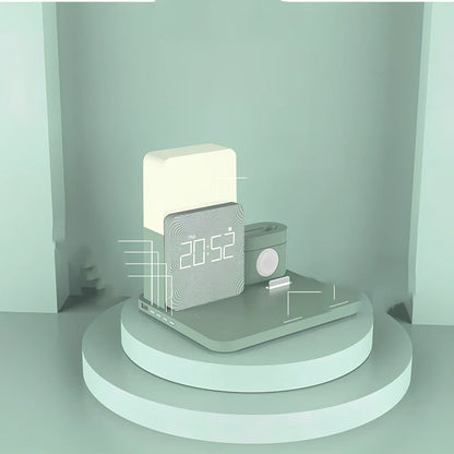 Black 3-in-1 wireless charging station with iPhone on charging pad, Apple Watch in slot, AirPods Pro charging