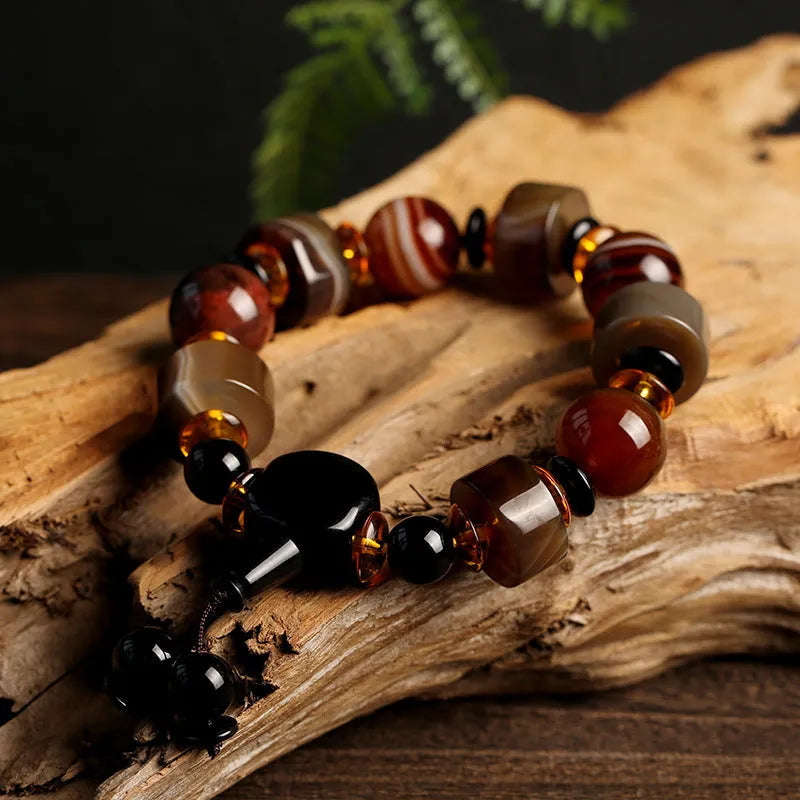 Natural agate ethnic bracelet with geometric design featuring multiple agate bead types and sizes