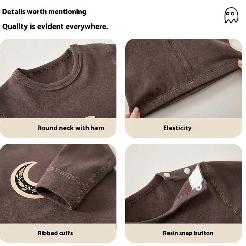 Baby wearing long-sleeved cotton pajamas with cartoon pattern, available in heights 66-120cm