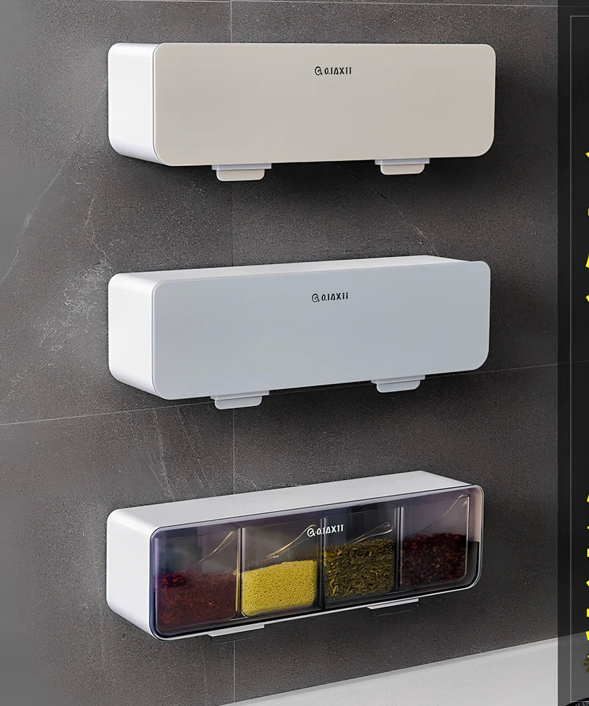 Wall-mounted plastic spice box set with multiple compartments and measuring spoon in kitchen
