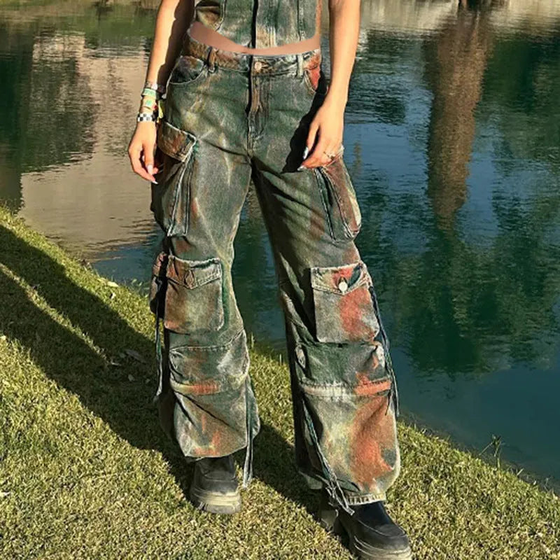 Loose fit multi-pocket cargo denim trousers with gradient colour panels on the pockets.