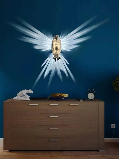 3D eagle owl wall lamp projector showing resin silhouette construction and projected shadow patterns