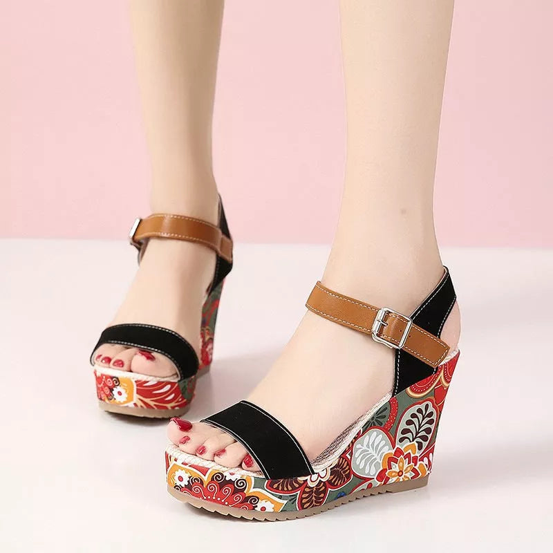 Women's floral embroidered high wedge sandals with buckle strap in black, green, and orange