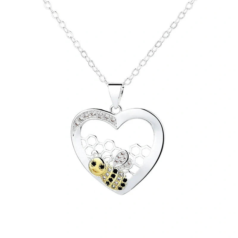 Pastoral-style bee hive pendant necklace with hearts color separation, made of copper