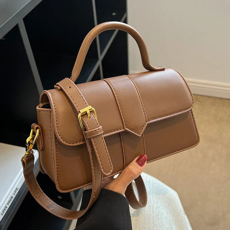 Women's beige messenger bag with horizontal square shape, 22cm width, and file compartment for commuting