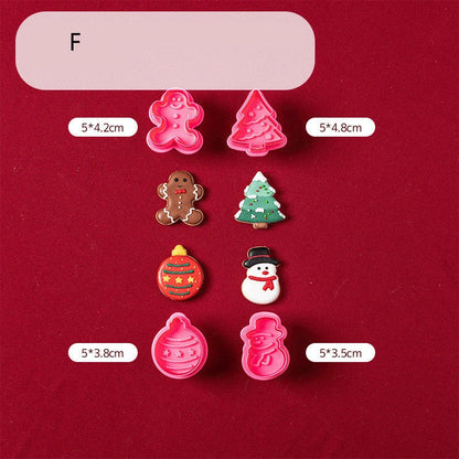 Stainless steel Christmas biscuit mold set featuring various festive shapes for holiday baking