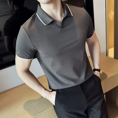 Men's short sleeve lapel polo shirt in a cotton blend fabric shown in solid colour options.