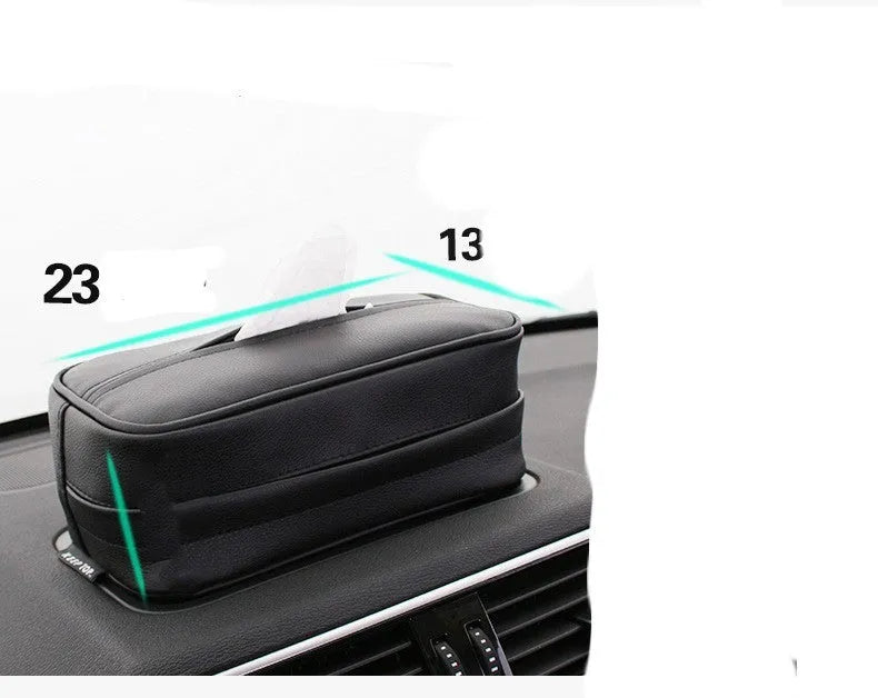 Black leather hanging storage box with PU coating, dimensions 23x13x9cm, shown behind a car headrest