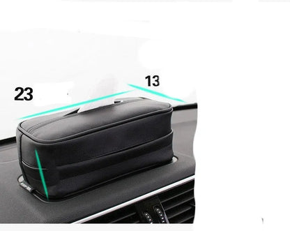 Black leather hanging storage box with PU coating, dimensions 23x13x9cm, shown behind a car headrest