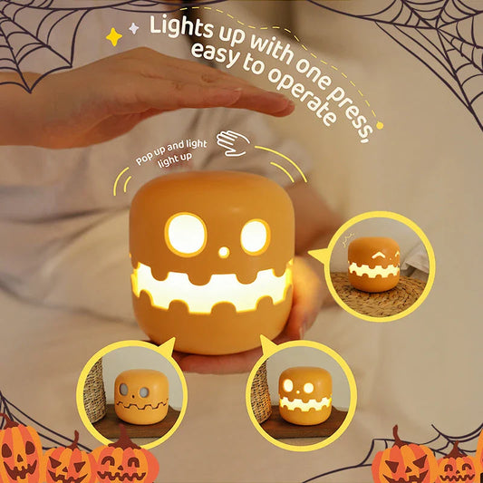 Pumpkin-shaped nightlight with soft silicone construction and warm, soothing glow for creating a cozy Halloween atmosphere
