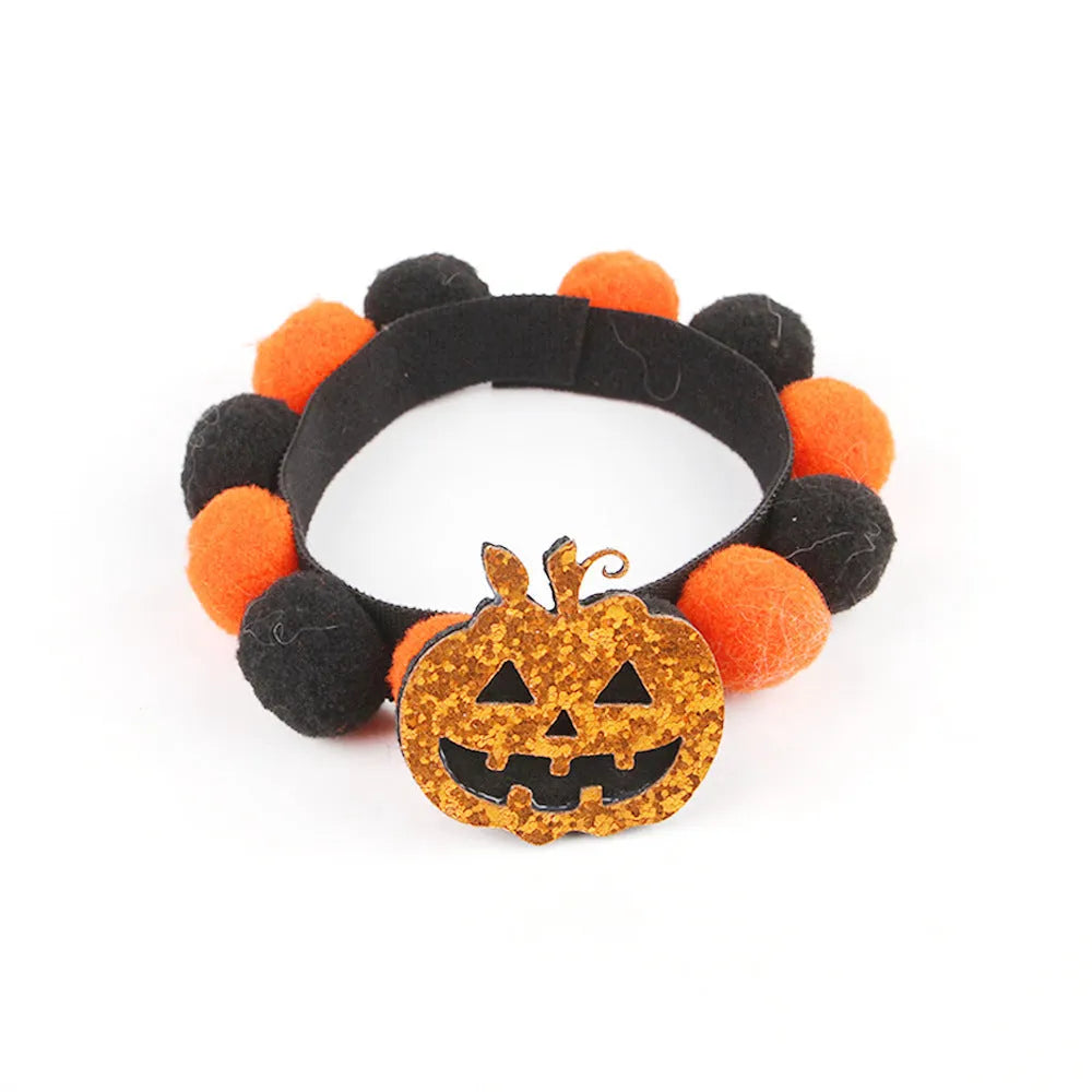Halloween fur ball pet collar with pumpkin, pirate, witch and skull designs in six colour options