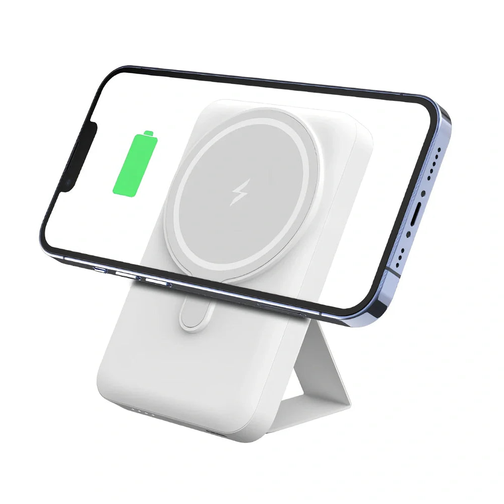 White Magsafe magnetic power bank showing magnetic charging side and USB ports