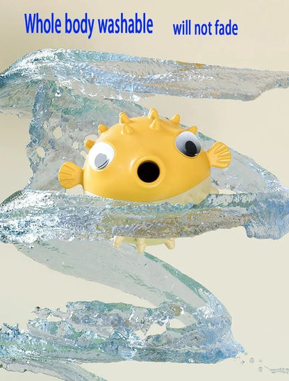 Green fish-shaped interactive dog toy with treat dispensing feature and internal bell for medium large dogs