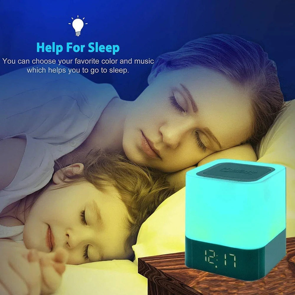 Square Bluetooth speaker alarm clock with touch screen and multi-colour LED lighting, measuring 100x100x112mm