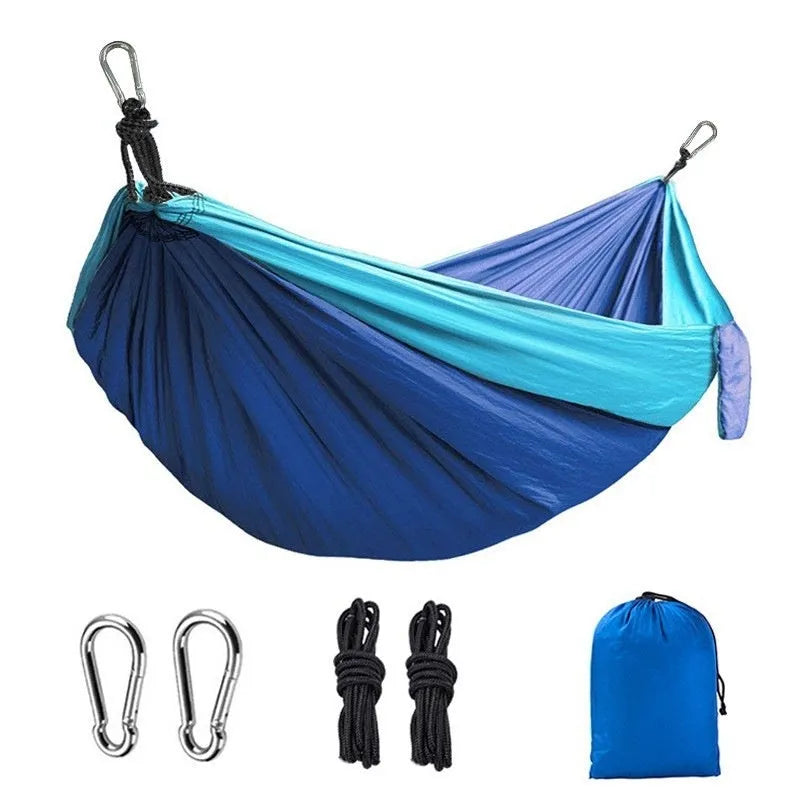 Outdoor camping hammock in sapphire blue colour showing 270cm length and 140cm width dimensions