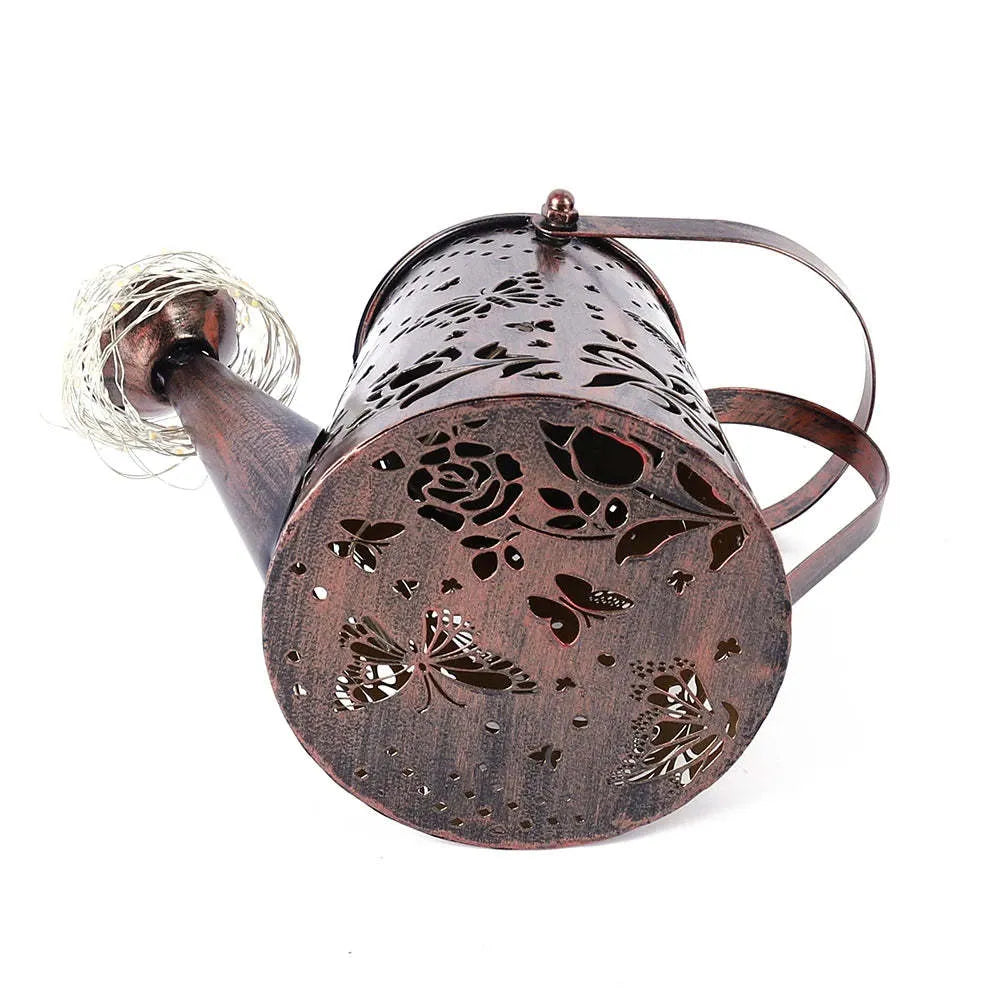 Solar-powered garden lamp with tapered butterfly pattern iron design and warm white LED light