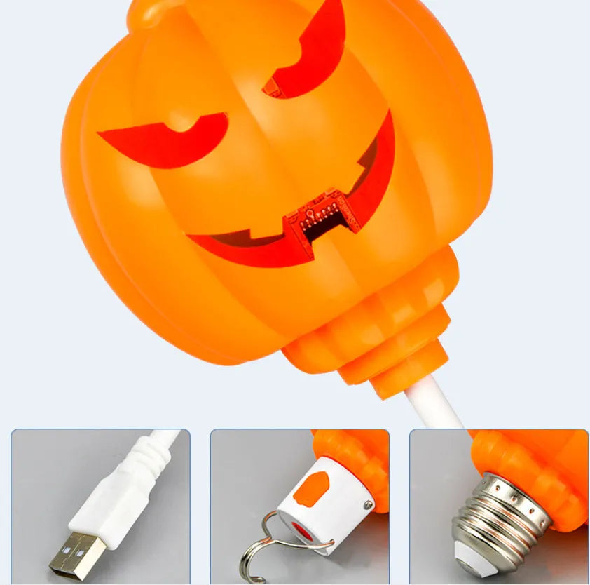 Plastic pumpkin decorative lamp with USB cable, available in purple or yellow light, measuring 22cm tall