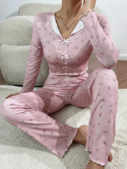 Stylish two-piece loungewear set in vibrant floral prints, featuring a long sleeve top and coordinating pants for all-season comfort and versatility.