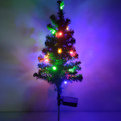 Solar-powered Christmas tree garden light with green ABS construction and warm white LED illumination