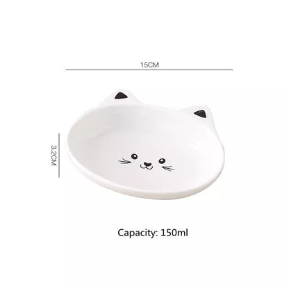 Ceramic pet food bowl with cat face design, easy to clean porcelain material