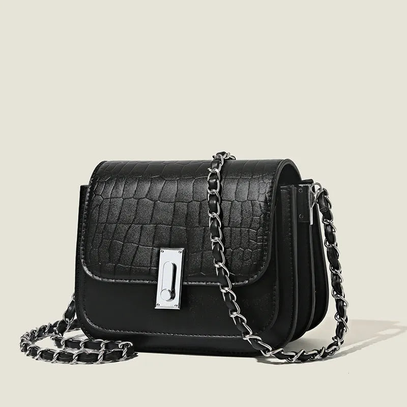 Women's soft PU shoulder bag with chain strap, horizontal square design in black colour showing sandwich pocket