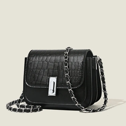Women's soft PU shoulder bag with chain strap, horizontal square design in black colour showing sandwich pocket