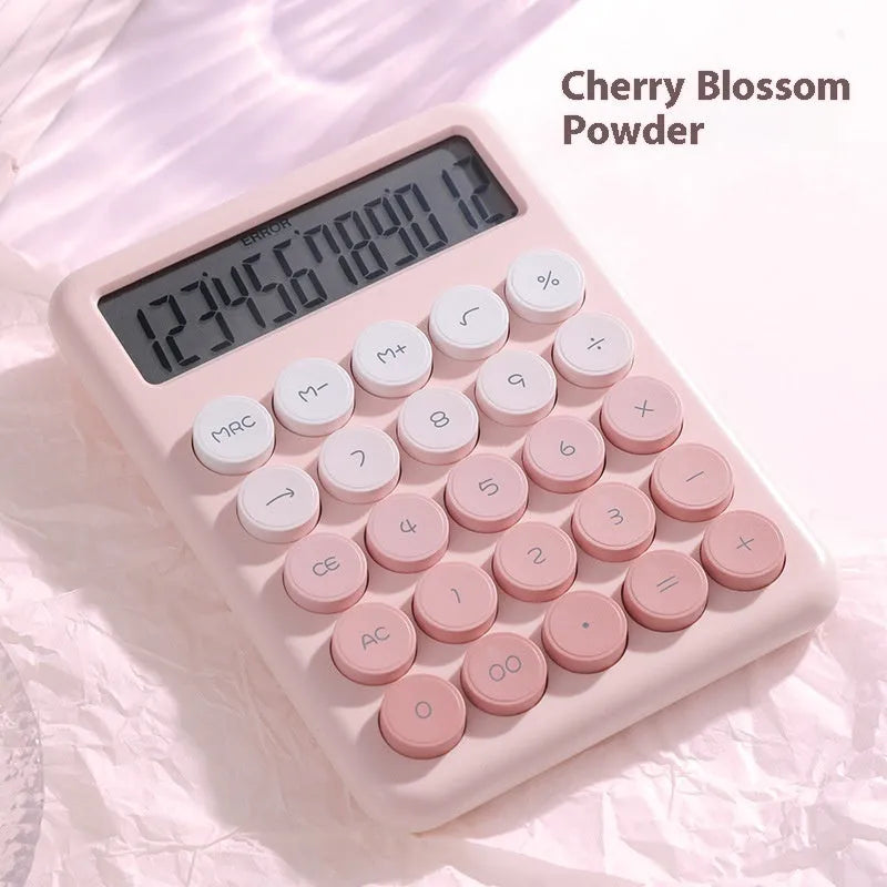 Gradient colour desk calculator with 12-digit display in violet, cherry blossom powder, glacier blue, or mint green options