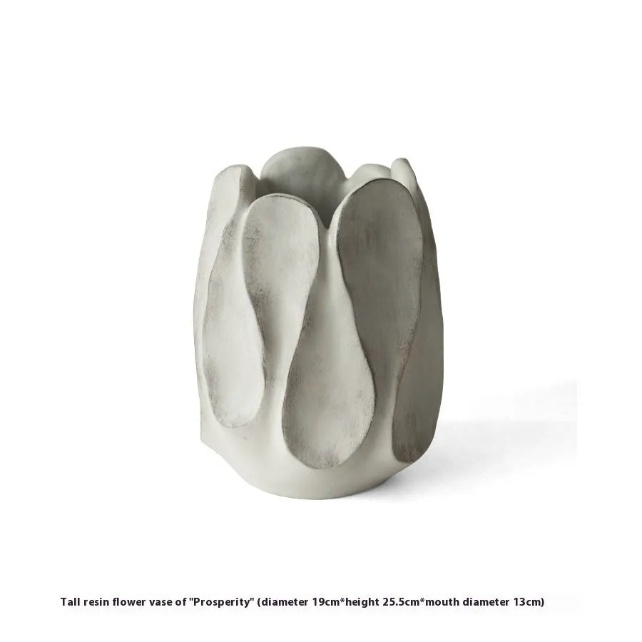Handcrafted irregular ceramic vase with asymmetrical shape made from magnesium clay for flower arrangements