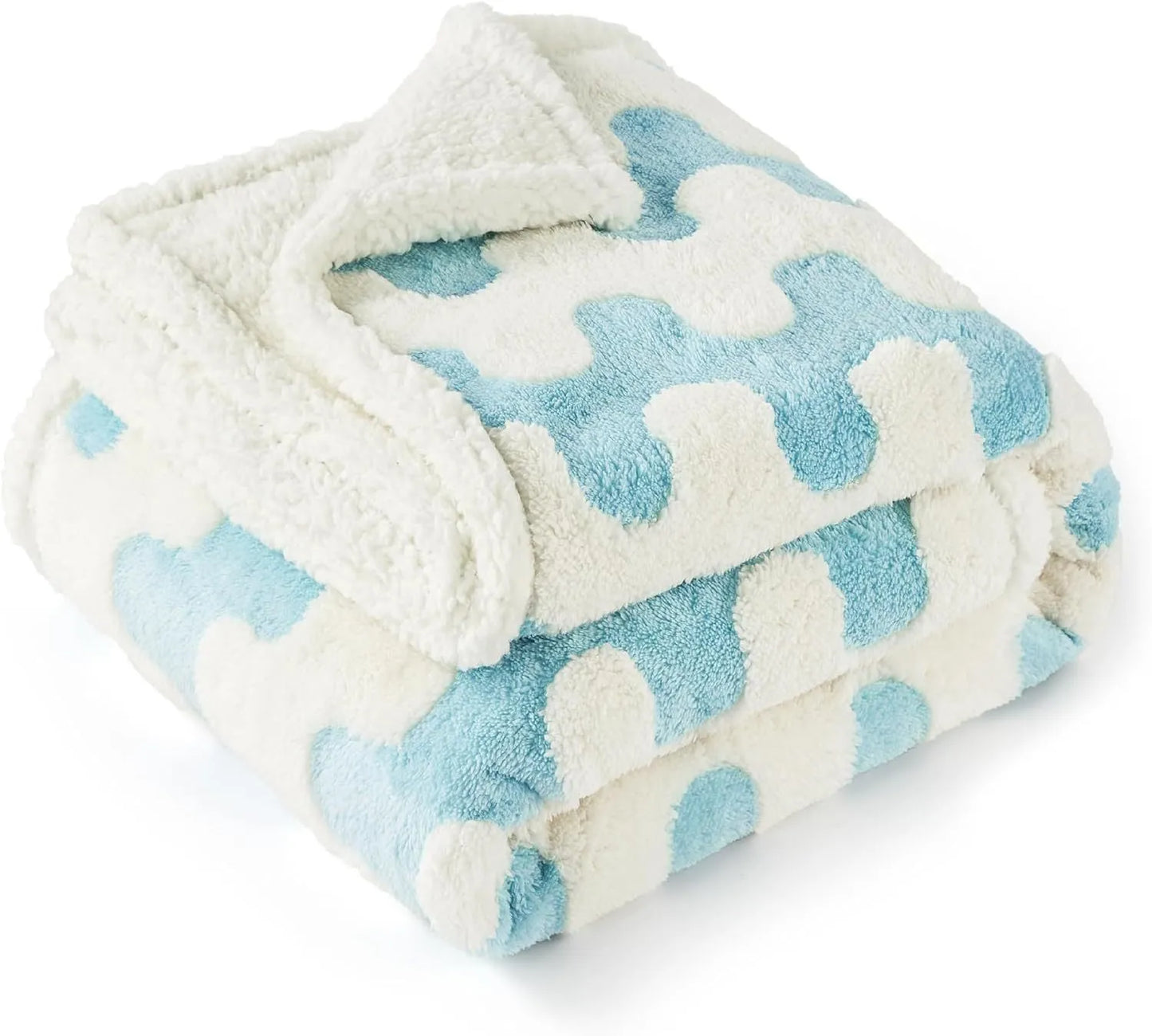 Blue and white patterned waterproof dog blanket on furniture showing cloth texture