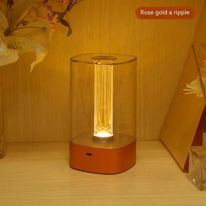 Rose Gold LED touch atmosphere lamp with abstract pattern on bedside table